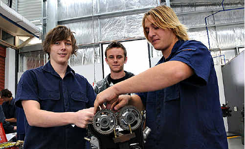Caine Quick, Jimmy Dussel and Ellis Peters work on an engine at the Gympie TAFE open day yesterday. Caine Quick, Jimmy Dussel and Ellis Peters work on an engine at the Gympie TAFE open day yesterday.